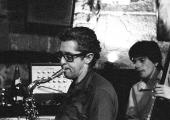 At the Club St. Germain, Barney Wilen blows. Bassist Jean-François Jenny-Clark is behind him