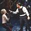 Andrew Polec as Strat confronts Rob Fowler's Falco