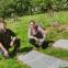Countertenors Andreas Scholl and Iestyn Davies at the grave of Alfred Deller, Britten's first Oberon