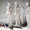 Wearing Nancy Bryant's eerily effective white masks, the conspirators contemplate Prospero (Eric Beauchesne).
