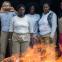 Piper (Taylor Schilling), Taystee (Danielle Brooks), Janae (Vicky Jeudy), Cindy (Adrienne C Moore) and Alison (Amanda Stephen) burn the MCC's bribes