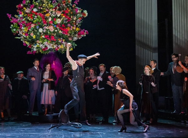 Dancers James Aiden Kay and Rose Ellen Lewis with members of the company in Opera North's La Rondine