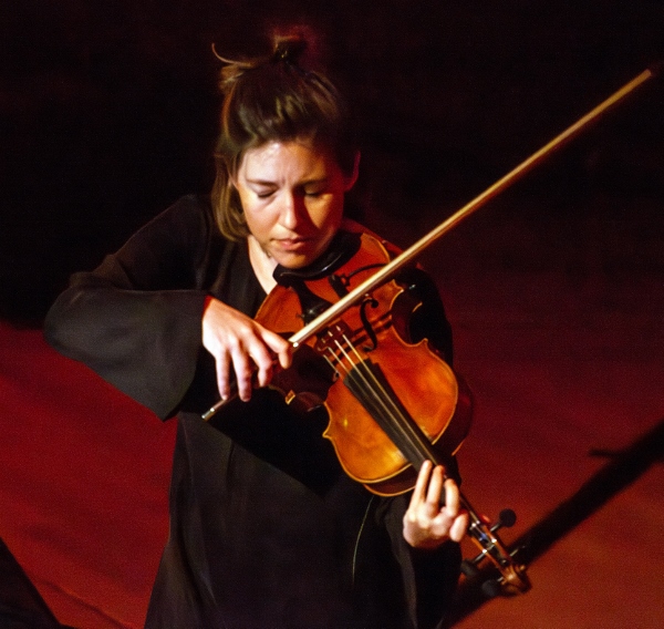 Ruth Gibson plsying with Manchester Collective at the Bridgewater Hall, Manchester