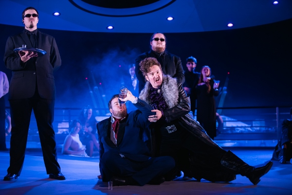 Dominic Mattos as Orlofsky, Conrad Chatterton as Eisenstein, and company in the RNCM's production of Die Fledermaus. cr Robin Clewley