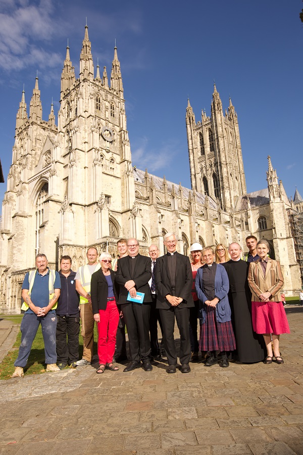 Dean Robert Willis (front centre) with staff at Canterbury cathedral Photo: Pete Dadds © BBC 2014