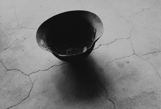 Shomei Tomatsu Steel Helmet with Skull Bone Fused by Atomic Bomb, Nagasaki 1963; © Shomei Tomatsu - interface. Courtesy Taka Ishi i Gallery, Tokyo  