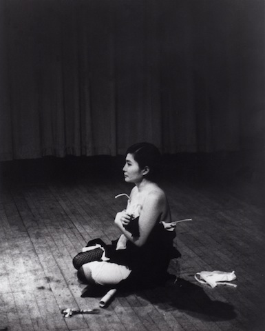 Yoko Ono, Cut Piece, Carnegie Hall, NY, March 21, 1965; Photo: Minoru Niizuma; Courtesy of Yoko Ono