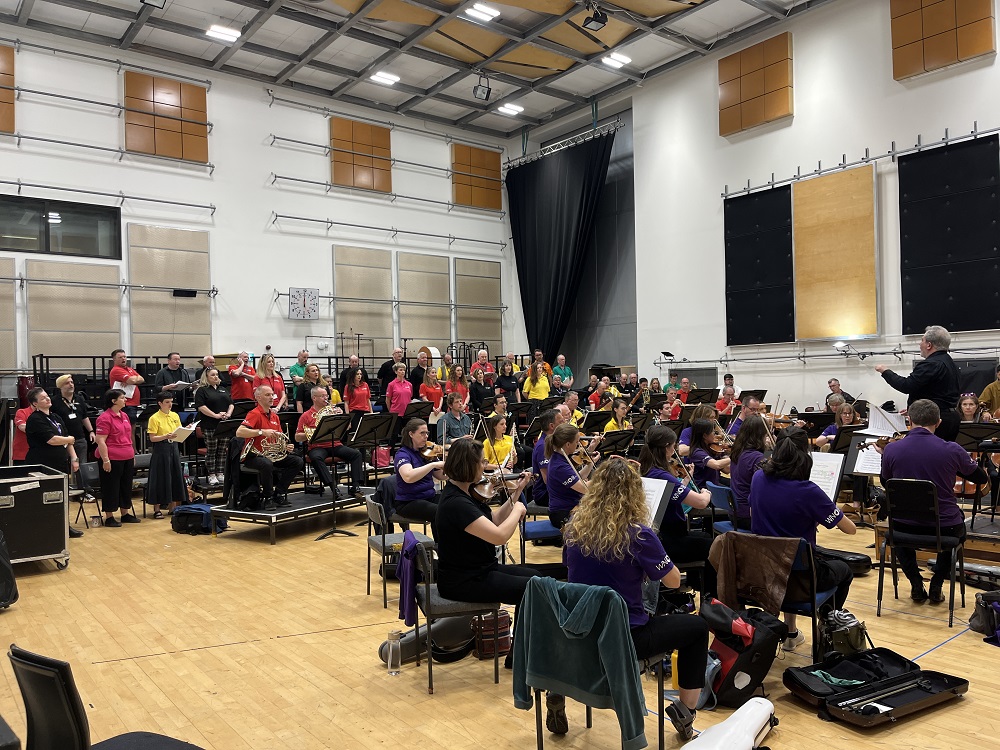 Carlo Rizzi rehearsing the WNO Chorus and Orchestra