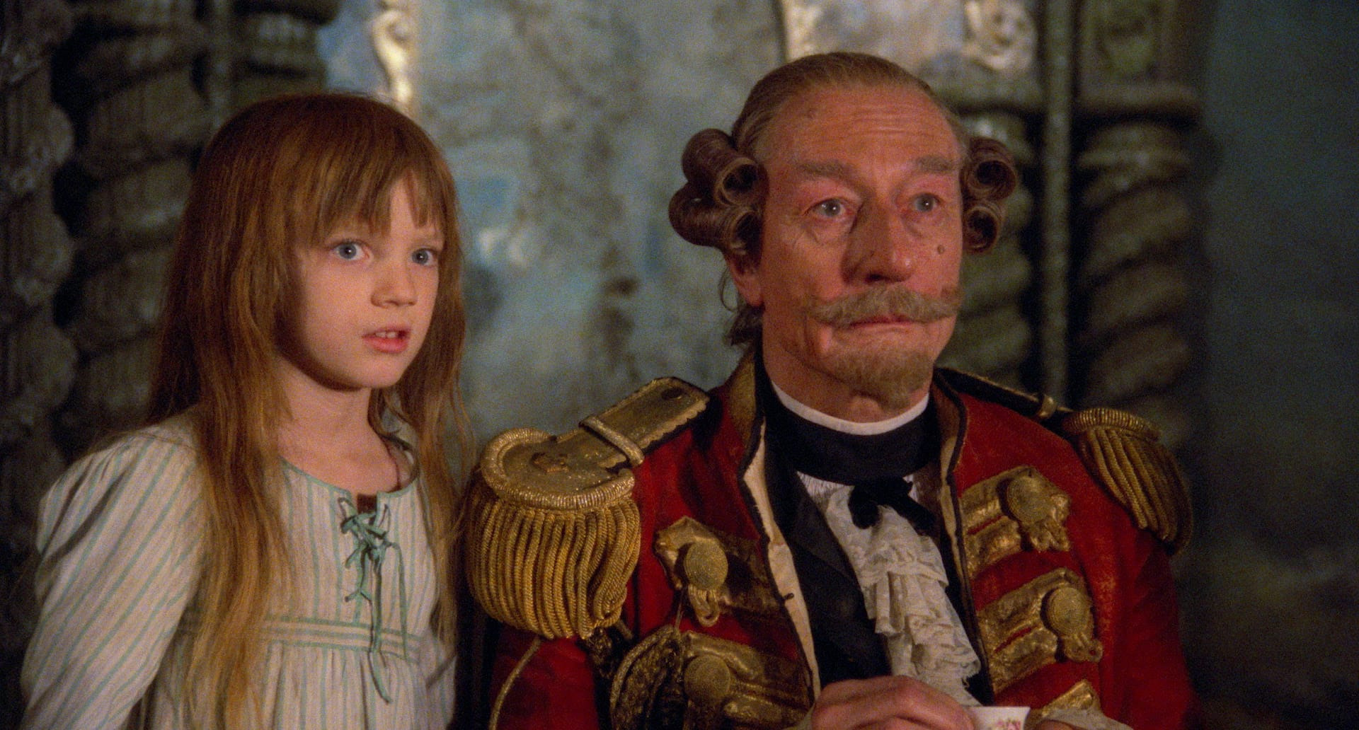 Sarah Polley and John Neville in The Adventures of Baron Munchausen