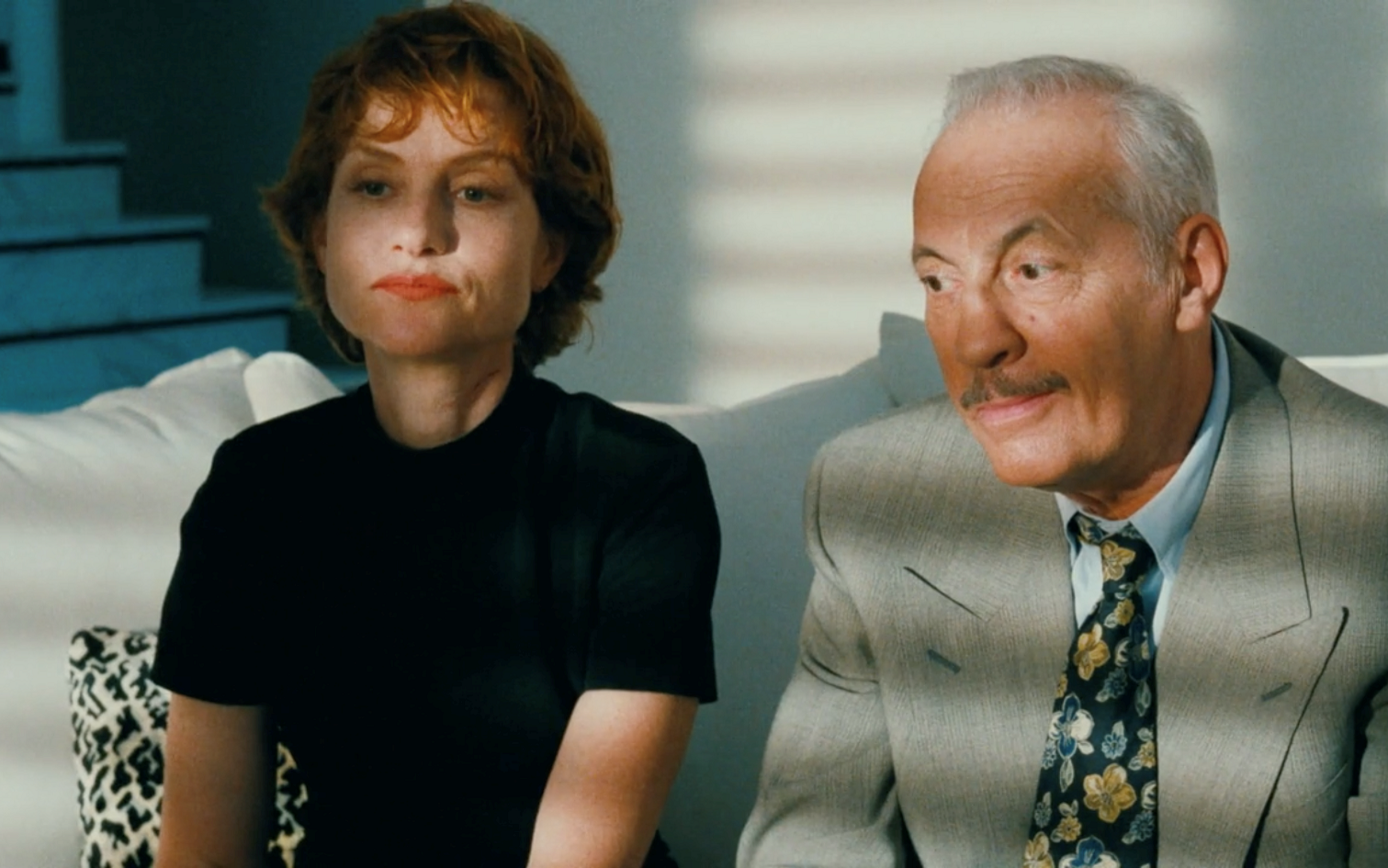 Isabelle Huppert and Michel Serrault in The Swindle