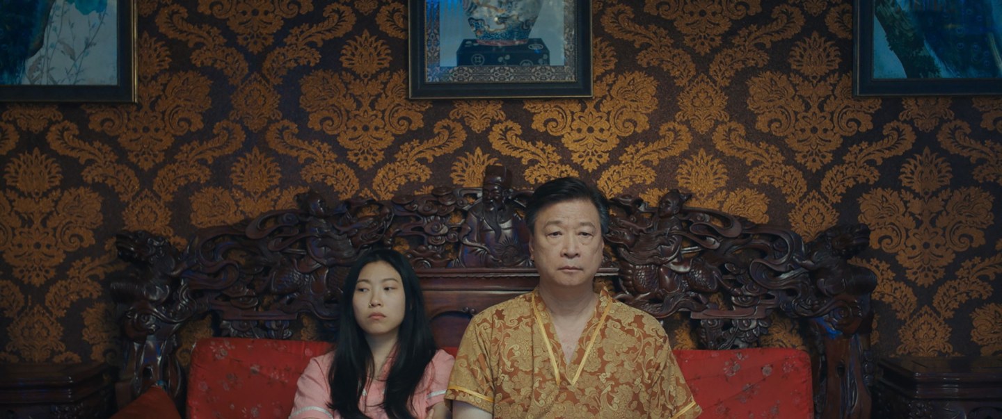 Billi (Awkwafina) and dad Haiyan (Tzi Ma) in The Farewell