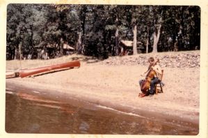 Arthur Russell playing the cello on a beach in Minnesota, circa September 1971. Photograph by Charles Arthur Russell, Sr. Courtesy of Charles Arthur Russell, Sr., and Emily Russell.