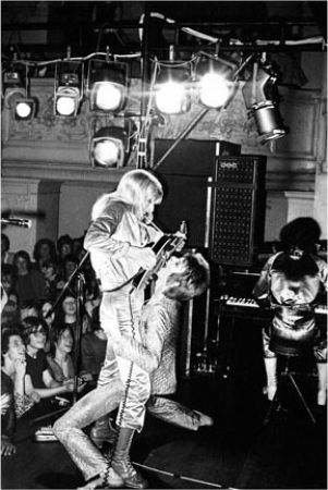 BowieRonsonGuitarFellatio1972cMickRock