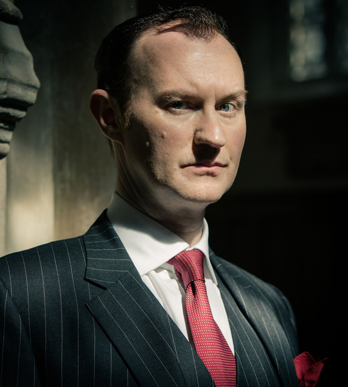 Mark Gatis as Mycroft Holmes 