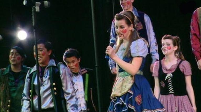 An American show choir emoting for all they're worth