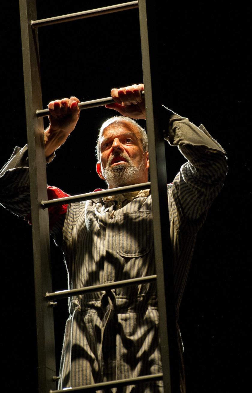 The Officer (Omar Ebrahim) contemplates his beloved machine