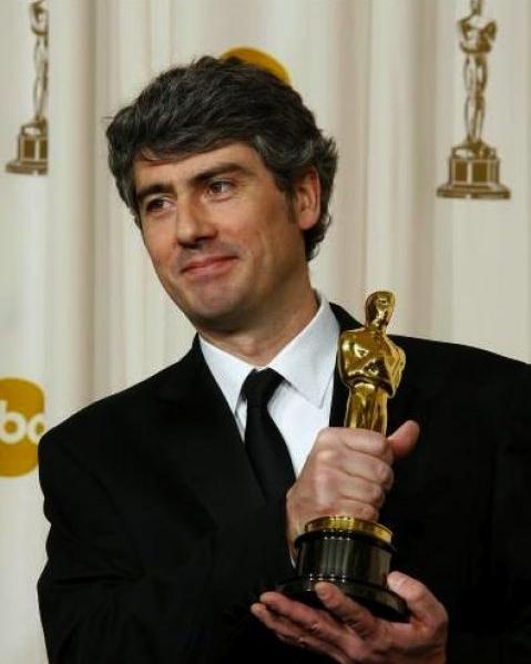 Composer Dario Marianelli wields his Oscar for his score to the film 'Atonement'