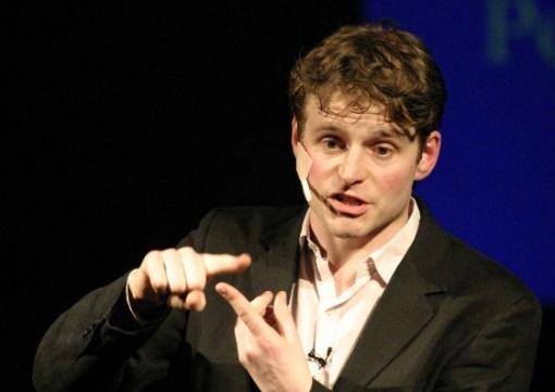 Will Adamsdale as Chris John Jackson, a manic, self-promoting American life coach