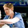 Edie Falco as Nurse Jackie, dedicated nurse and serial rule-breaker