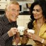 Bruce Forsyth and wife Wilnelia Merced-Forsyth act naturally for the cameras