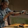 George Clooney as Jack in 'The American'; 'More brutal than Bond'
