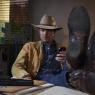 These boots were made for moseying: Timothy Olyphant puts his feet up in 'Justified'