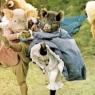 Pigling Bland (Alexander Grant) and his Berkshire sweetheart (Brenda Last) join in the animal tarantella