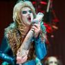 'A glam-rock vision in blue shiny fabric and Heseltinian blond wig': Mark Le Brocq as Ponto the Lion