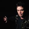 Rich Hall on tour: Swigging his beer bottle, he comes across as grumpy with twinkles