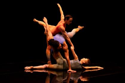 Three's company: Jules Cunningham (on the floor) with Harry Alexander and Melanie Chisholm in 'how did we get here?'