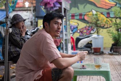 'A world that’s more alien than familiar': Kit (Henry Golding), in a Vietnamese market