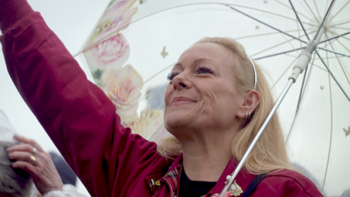 Activist Lynn Gibson stands up for the miners
