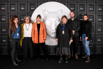 Tiina Lokk (centre right) and filmmakers dressing down for the black carpet at PÖFF25