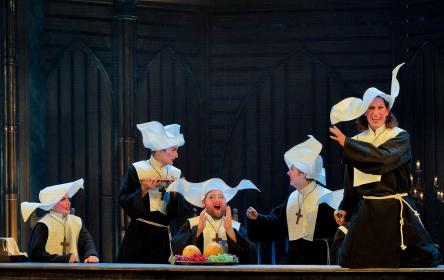 Jacques Imbrailo's Raimbaud (right) leads fellow nuns in tasting the delights of the castle cellar