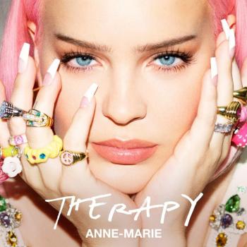 A successful 2021 pop star wearing lots of rings