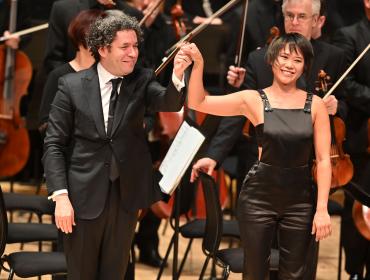 Gustavo Dudamel and Yuja Wang after the London premiere of John Adams's 'Must the Devil Have All the Good Tunes?'