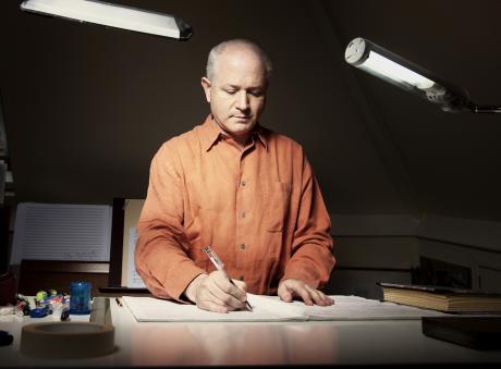George Benjamin at his writing desk, credit Matthew Lloyd
