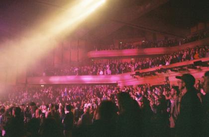 The Barbican Hall auditorium bathed in pink light