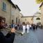 Simone Marzocchi fanfares Ermanna Montenari, Marco Martinelli and participants away from Dante's tomb towards Purgatory