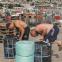 Martin Parr, 'Preparing lobster pots, Newlyn Habour, Cornwall, England', 2018