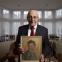 Another world: Manfred Goldberg, holding a painting of his brother