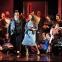Cinders in the clutter: Alix Le Saux (centre right) with Adam Marsden as the King