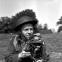 'Shooting the War': Tommy lays down his gun to get a good shot