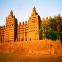 Morning breaks over the Djenne mosque in Mali