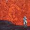 Katia Krafft wearing aluminised suit standing near lava burst at Krafla Volcano, Iceland