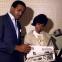 Z.Z. Hill and Mary Love check out the music biz trade papers