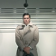 Alain Delon, trenchcoated for the identity parade