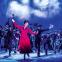 Sky high: Mary Poppins (Zizi Strallen) joins the sweeps on the rooftop for "Step in Time"