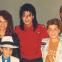Michael Jackson and the Robson family in 1990 (Wade Robson, front left)