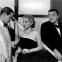 Dan Duryea, June Vincent, and Peter Lorre ponder a talismanic brooch in 'Black Angel'